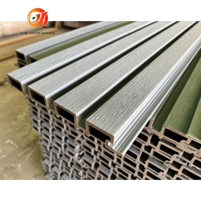 Co-extruded outdoor wall panels with reinforced coating